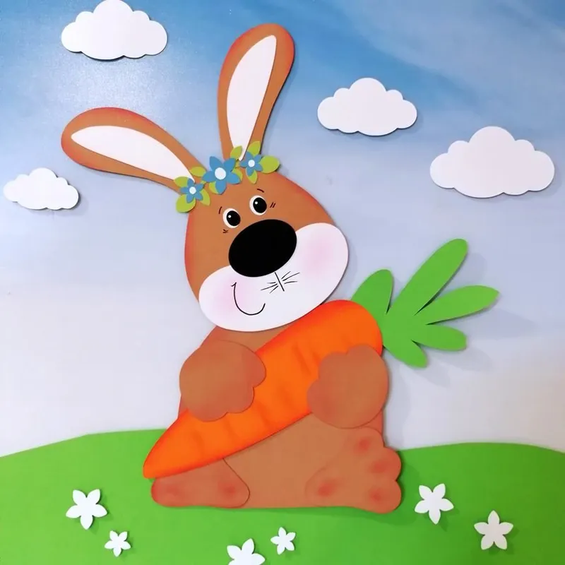 Hase mit Möhre aus Bastelpapier für die Osterzeit