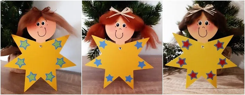 3 Sterne mit Gesichtern aus Bastelpapier vor Tannenzweigen