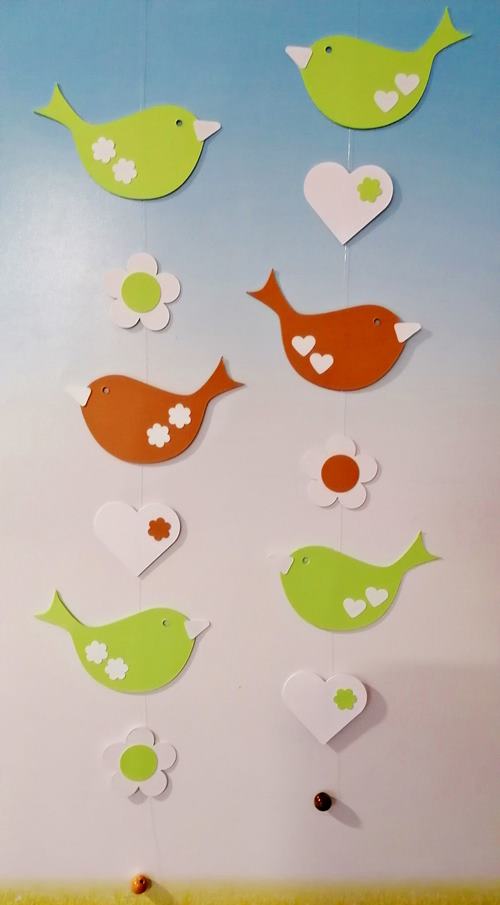 Motivketten mit Vögeln und Herzen