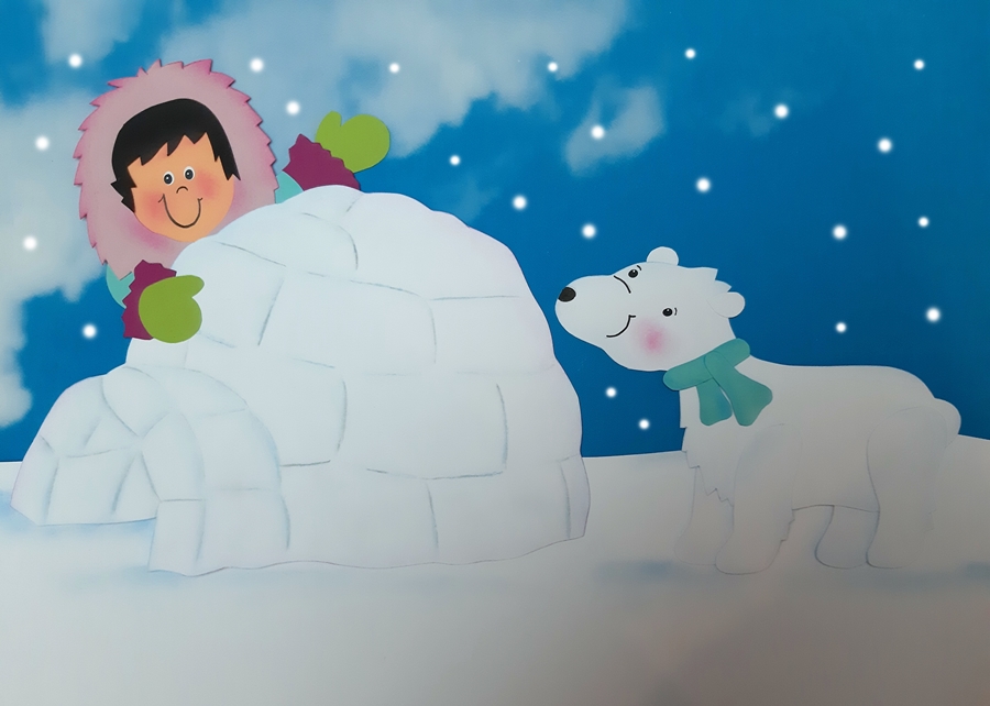 Eskimo und Eisbär beim Iglu