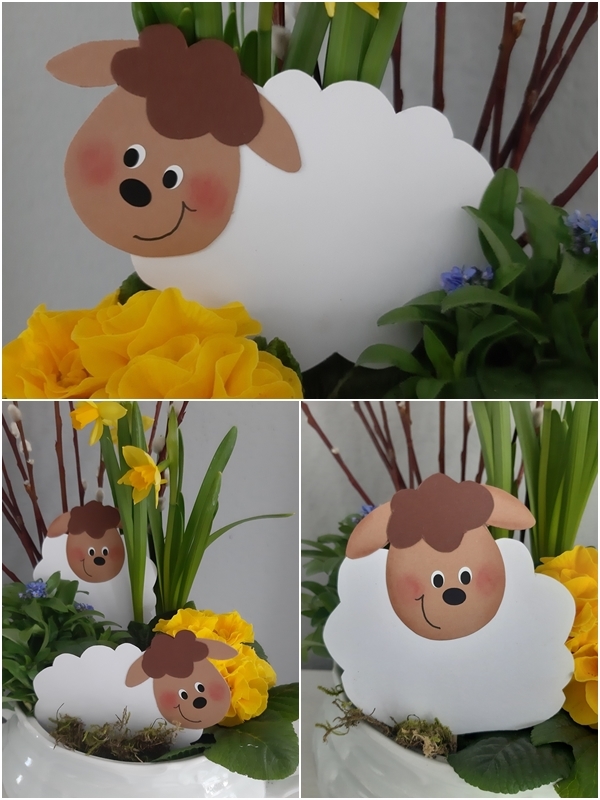 Frühlingslämmer aus Papier in einer Blumenschale