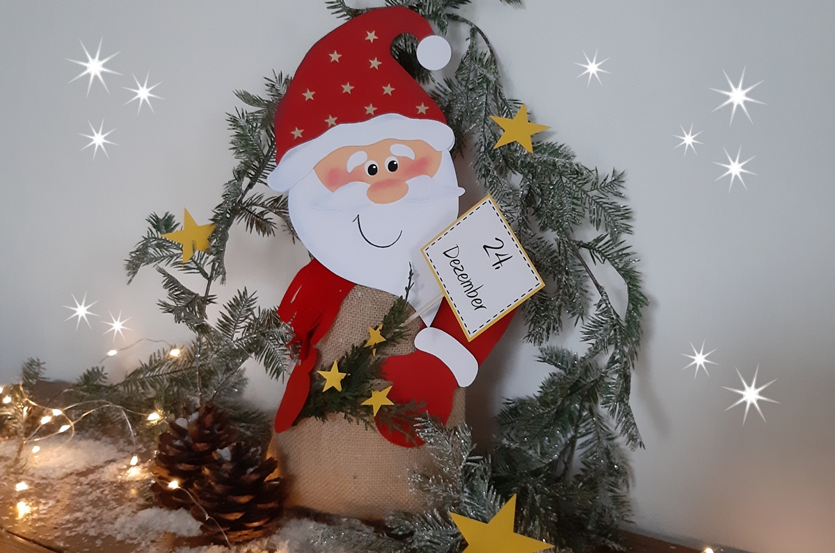 Weihnachtsmann mit Geschenken – eine Idee aus der Buntpapierwelt.de